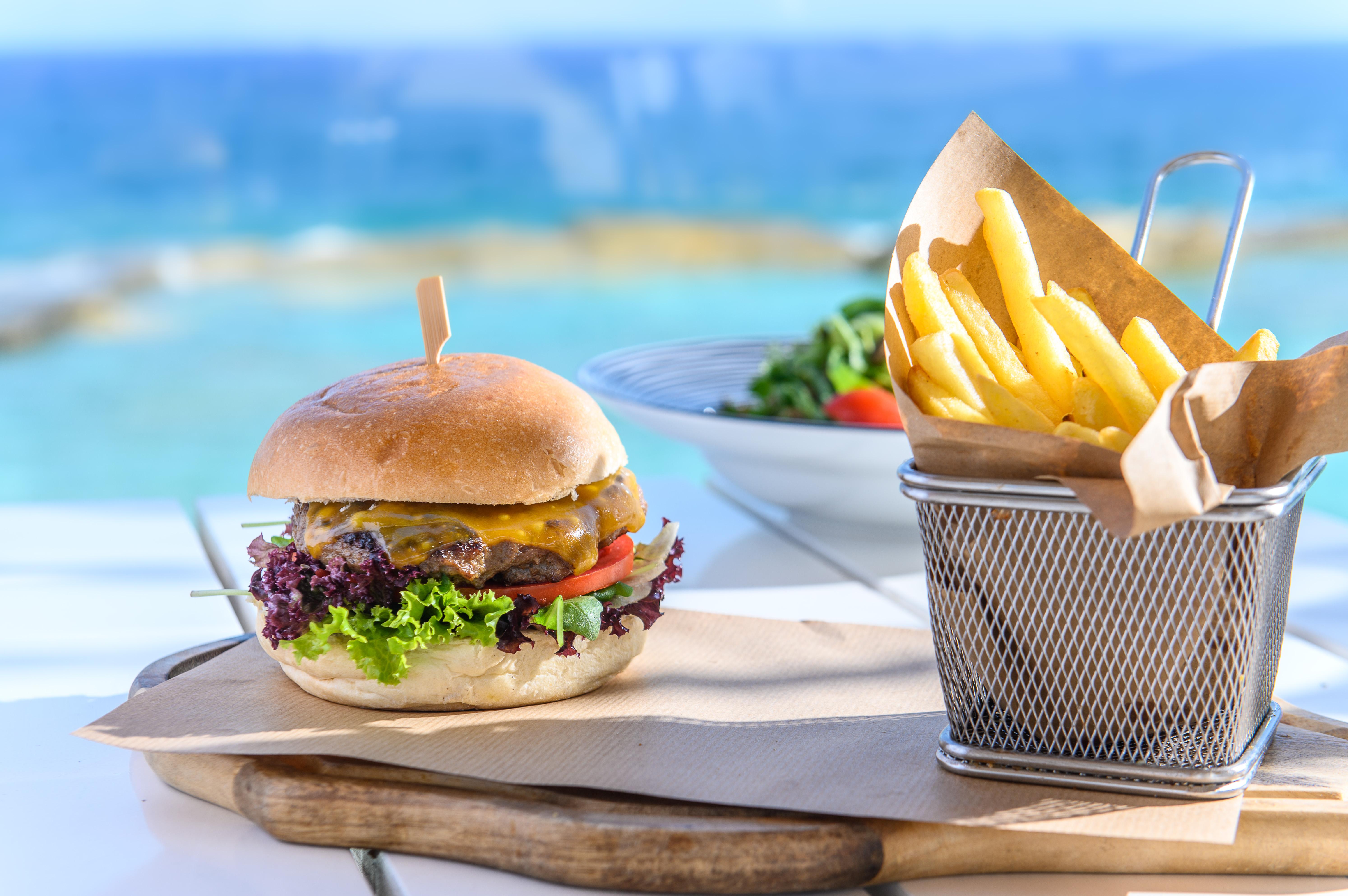 Minos Imperial Luxury Beach Resort & Spa Milatos Exterior photo A cheeseburger and chips