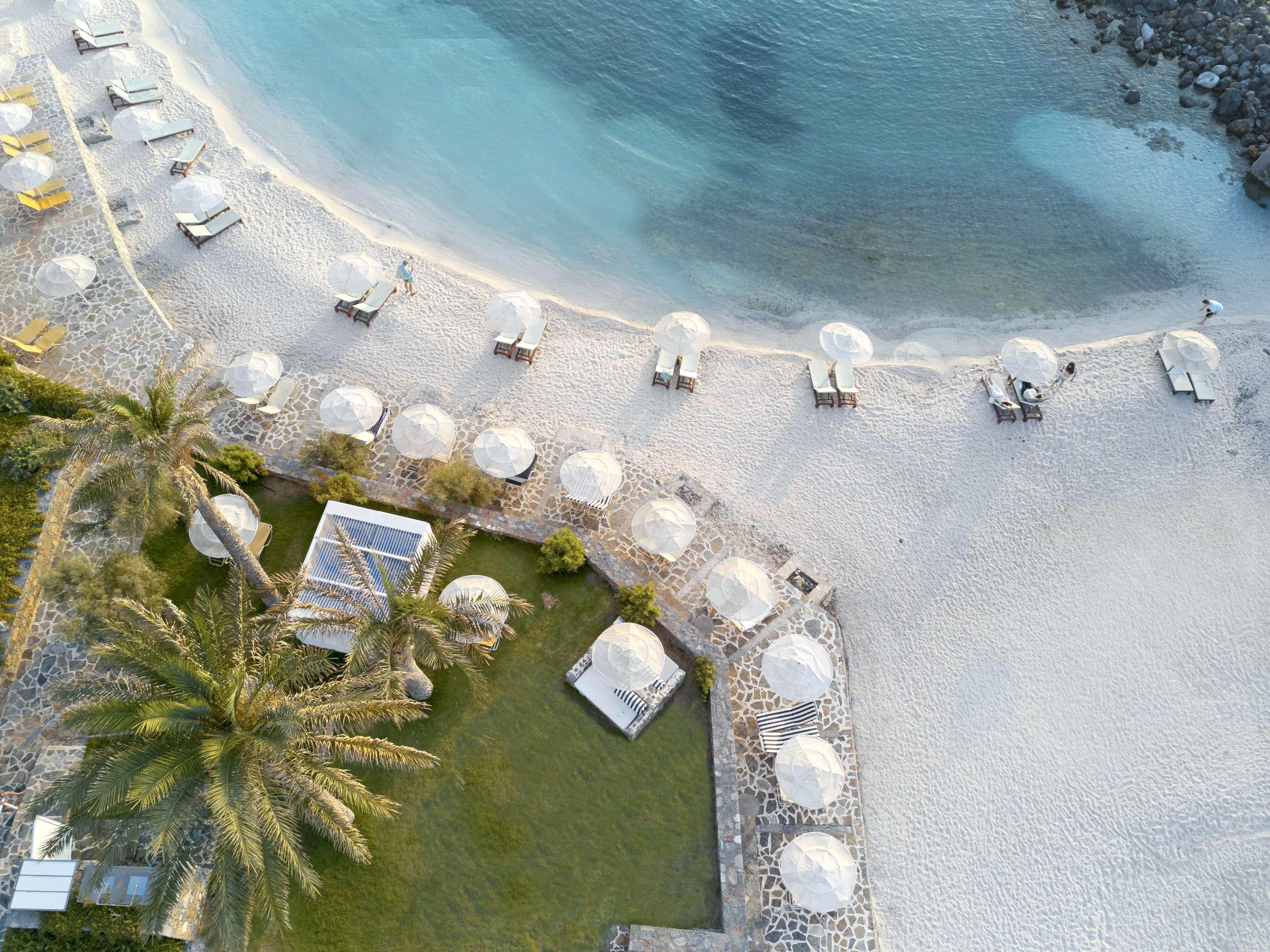 Minos Imperial Luxury Beach Resort & Spa Milatos Exterior photo Aerial view of the beach at the resort