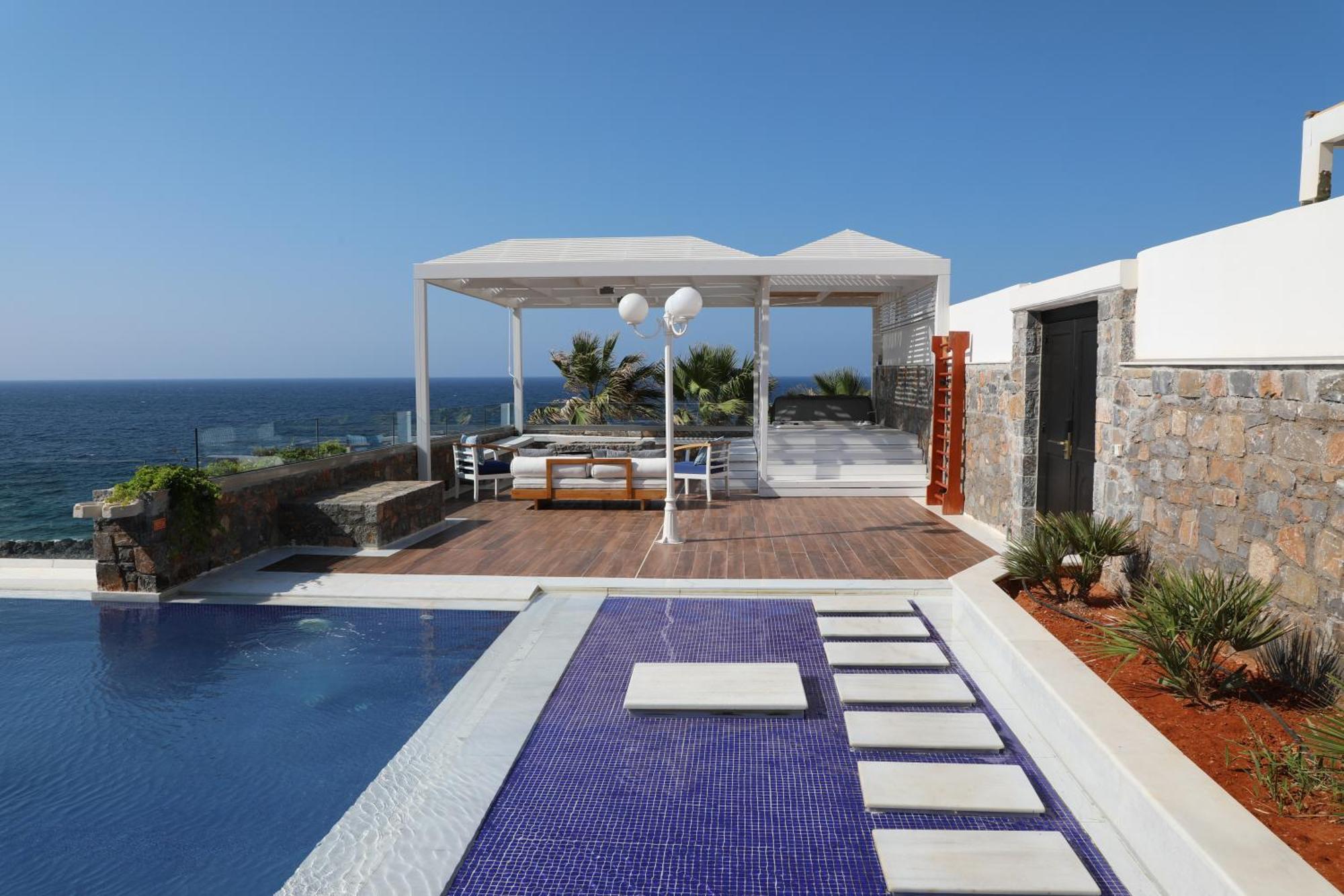 Minos Imperial Luxury Beach Resort & Spa Milatos Exterior photo The pool at the hotel